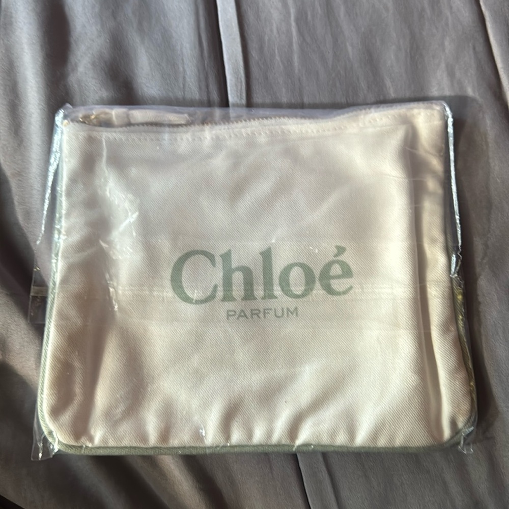 white chloé parfum pouch.